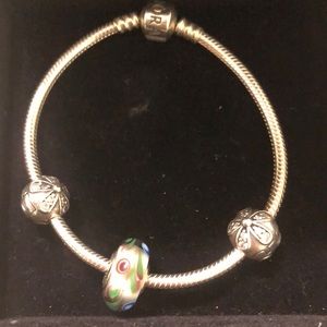 Pandora bracelet with 3 charms